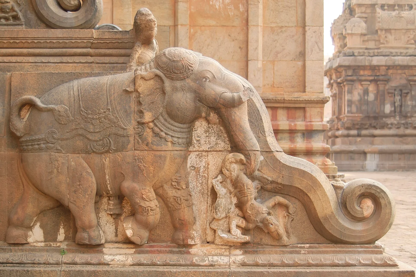 An elephant carved into a stone architectural detail at Brihadisvara Temple